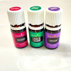 Young living essential oils patchouli, peace and calming, and envision